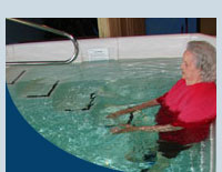 Patients exercise in the aquatic therapy pool to heal injuries.