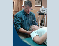Wylie's Northeast Wylie Chiropractic and Rehab Chiropractor gives a spine adjustment to a patient from Rwolett.